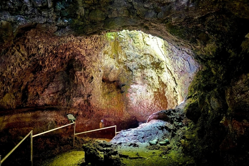 Colorful lava rock formations inside Hana Lava Tube